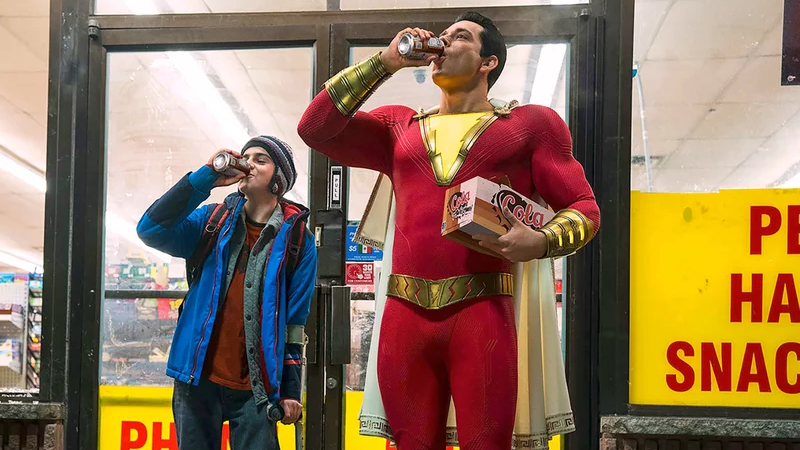 Shazam pops a nice cold cola with Billy Batson’s good friend Freddy Freeman (Jack Dylan).